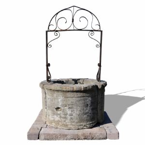 Ancient stone well. Dated 1594.